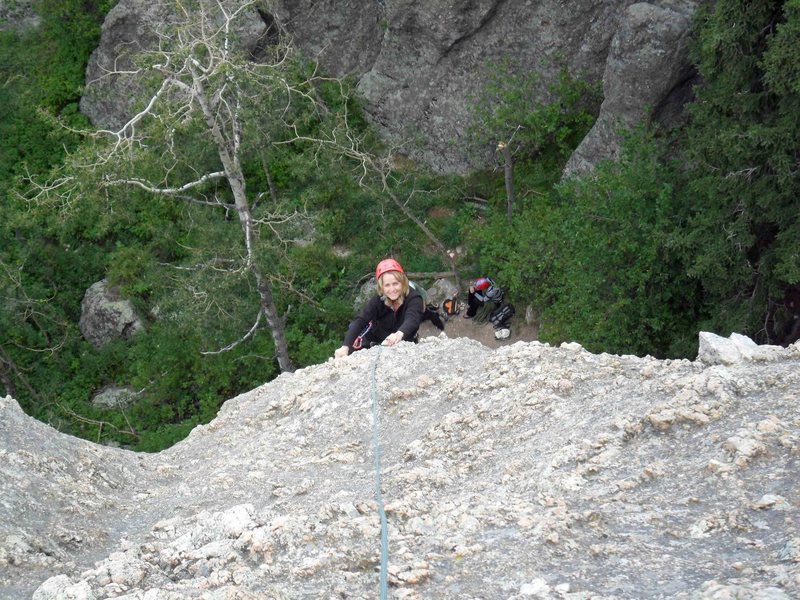 Brenda finishes up top of Katey's Route -- easy, well-featured climbing on the run out portion.