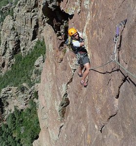 Nat finishing up the airy traverse on pitch 4.