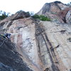 Scary run-out slab route. locals cut first bolts for metal. Berhala Island, Sabah.