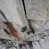 Me placing a cam at the crux - photo courtesy G. Helm