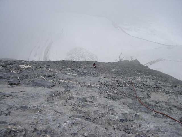 The approach to the Mittellegi hut is like climbing a slate roof with all loose tiles.