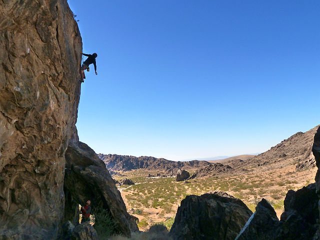 Joel shaking out on Backside Arete (5.11d), NJC 