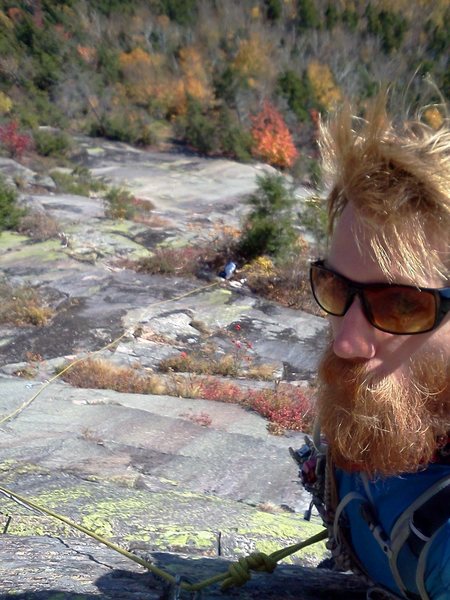 Another photo of my climbing the third pitch (money pitch!) of Southern Migration.  Bradley White can be seen belaying from below.  