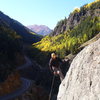 Rapping off the top of PEMA.  In the background:  the Million Dollar Highway and billion dollar fall views.