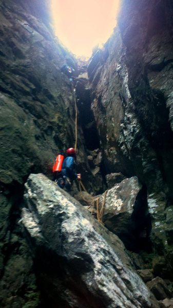 Rapping down the descent gully into the Amphitheater.