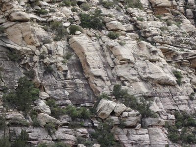 find the roof to the right of motorcycle mama (the giant left facing corner on the left side of the crag).  look below the roof at the shallow right facing corner.  follow to the roof and traverse left to gain the crack to the top of the crag.  you will be RIGHT of the bushes at top when you finish.  you can see the crack pretty well from bottom to top in this photo.