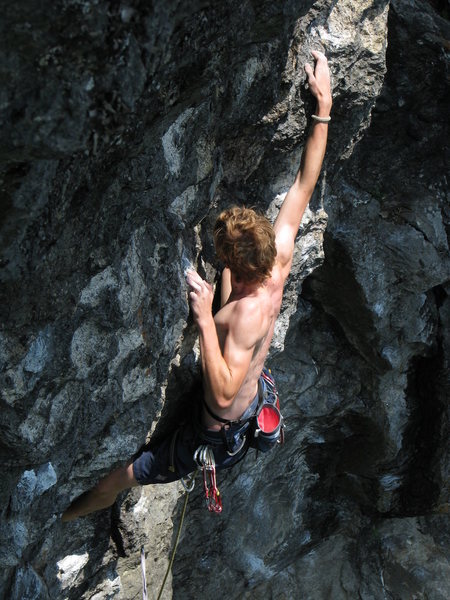 In the crux -The Oppurtunist, unknown climber<br>
<br>
Lots of nice air below at this point