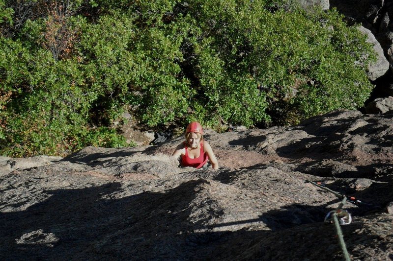 Brenda on Amp Right.<br>
Below, one can see the start is about 20ft into the trees from the rocks.