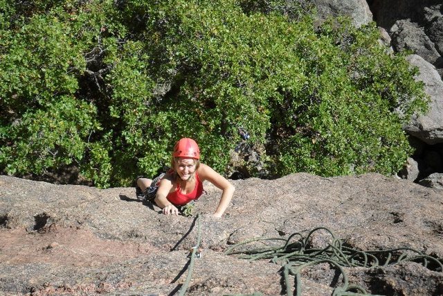 Brenda climbs Amp Left.