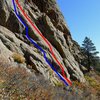 Hanging Judge follows the blue line.  The red line is Gimp Verde.  The two climbs share the same anchors.