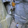 Climbing Gold Dust, belayed by Steve B., the beginning of Heathenistic Pursuit is on the left.<br>
<br>
Photo by Effie W.