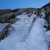 Carl Pluim leading pitch 3 ice on "Concrete Shoes".