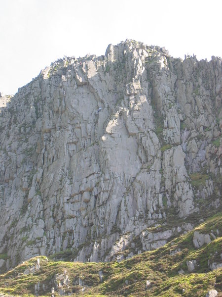 The slab on P2 of Gwydrin is in the centre of the photo, with its upper right hand side catching the sunlight.  The climbers are on Obsession.