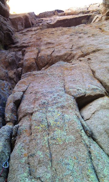 A look up the third pitch.  Stay in the crack on the left.  Notice the cave.  With a 60 m rope, you can make all the way into the first notch.  (lots of rope drag though)