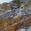 Lucander engaging the bolted crux section on p. 2 of Keep on Struttin.