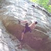 Redpoint crux, one last move to the good layback.