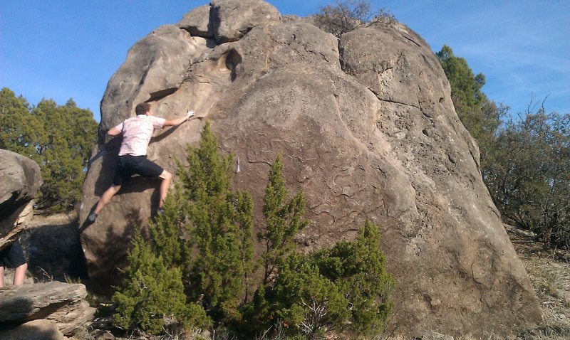 Austin on the Goodnight boulder, crux moves of Unscarred