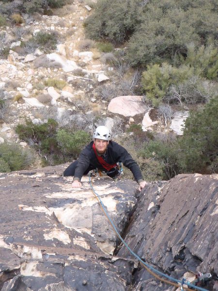 Solar Flare pitches 1 & 2 combined - climbing the corner after the crux roof.