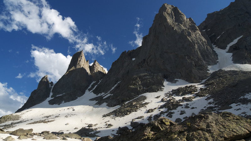 The route ascends the long curving corner system up through the prominent sunlit buttress. Might be one of the most aesthetic features around.