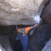 Everet gropes the large sloper on Pumping Romex. Two more long moves to the top of the prow.