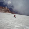 Newel Jensen dropping the knee, above the clouds on our telemark ski descent of Orizaba in 1997.