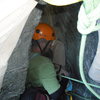 Climbing under the stone below the last pitch of the daddy.  Good place to relax and take shelter from the wind.