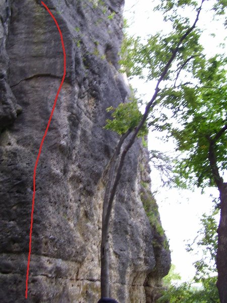 Starting from the southeast of the Quadrangle next to Up n Off. Climb up through thin face without holds from Up and Off and the obvious knob on the corner of the route. Use delicate holds up the overhang and look for the small bowl shaped under cling (crux). Strechy moves thru next section towards loose looking flake, then work your way to the top.
