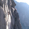 Merril Bitter leading during the first ascent in 1983. Photo, Gail Ellison.