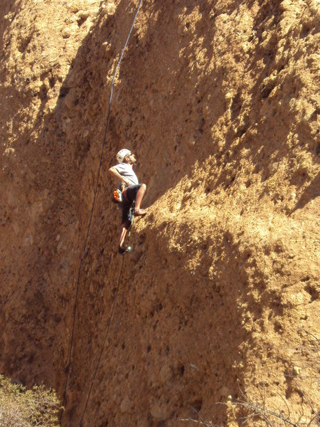 Climber enjoying the moves on "Spider's Line."