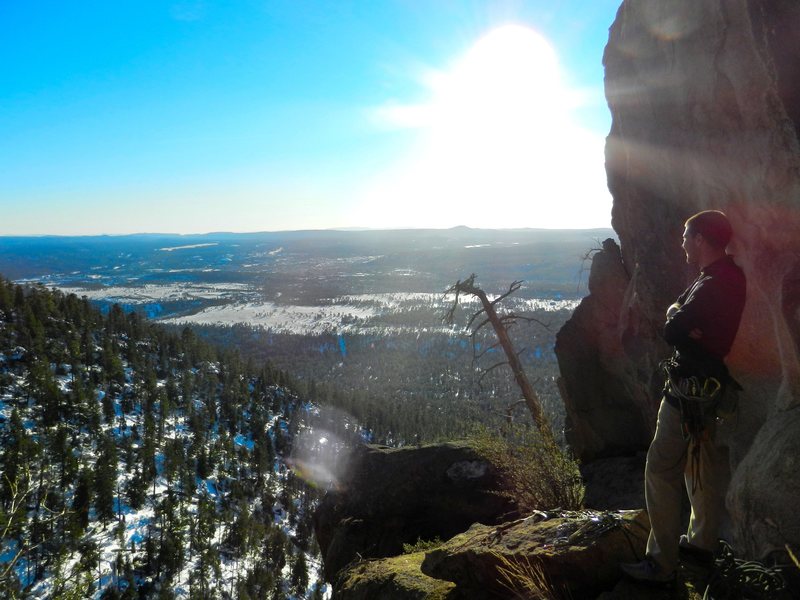 Wade taking in the view from the Lunar Ledge, base of pitch 4.  Flagstaff in the distance.