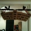 My hangboard. I took some accessory cord and used the top two holes so i can hang it from any pull up bar. I plan on mounting it later but for now its fun this way. The board tends to swing under when I'm using some of the small holds so it takes alot of core strength to stay on it. Anyone else tried this yet?