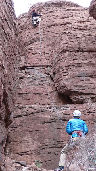 AMH on an early ascent, Hanna belaying, photos by DAS. Ignore the full rack of gear, it was for setting "Hale-Bopp" not for "Lil' Angel"!