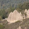 Climbers on 3 routes. Gives a good sense of scale.  65ft of fun. View from the approach trail.  