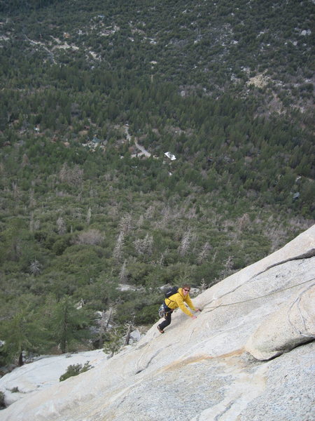 Standing over the roof on Coffin Nail. Belay from the alcove after the "traitor" horn and before the real horn.