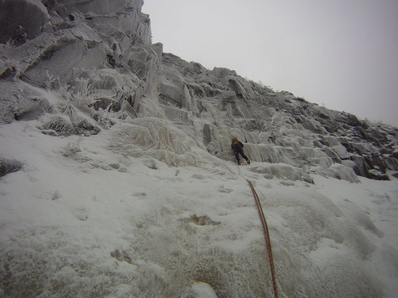 Zeb Engberg leading the third pitch in thin conditions. We wound up climbing the left pillar.