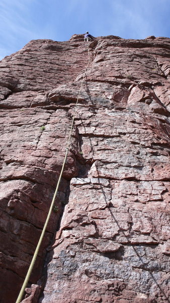 The route with Arjun pausing before clearing the bulge (forgetting that there was a bolt there!).