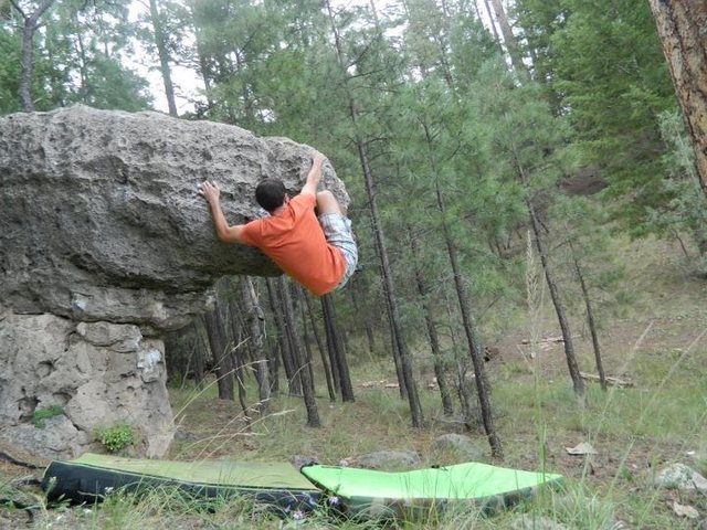 Alex kray on the first ascent of Smoking Gun.