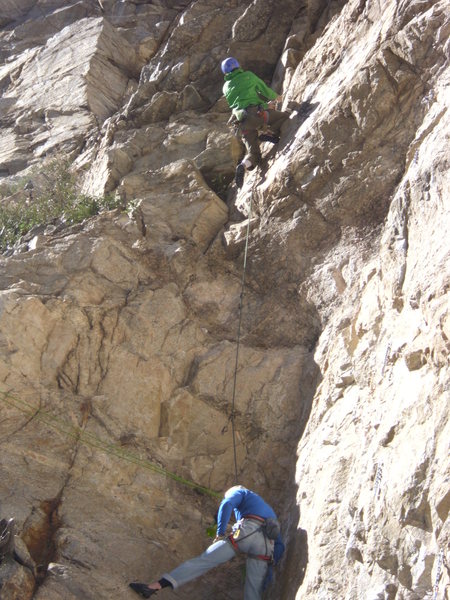 Aaron belaying Sam from chains at top of Good Girls.