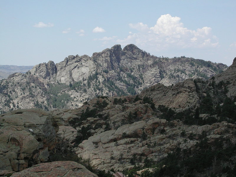 Split Rock as seen from Reese Mtn.  It's gneiss and other metamorphics but to some it's taken for Granite.