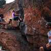 Caitlin getting into the crux on this problem. Nice and tall but with a good landing. <br>
<br>
Sept. 17th, 2011.