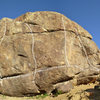 West face of the big lower boulder.