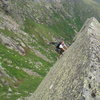 J. Stewart on Pinnacle Buttress' "Fairyland Traverse."