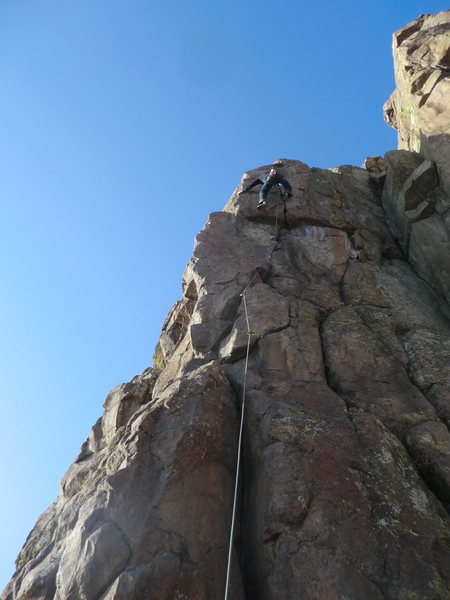 Josh Darnell climbing through crux on "Shadow of a Hang-Dog".