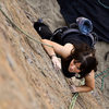 Sara works her way up the main face at Point Dume.