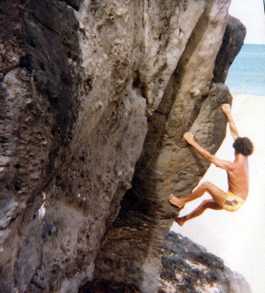 Olaf bouldering on the beach at Waimea Bay