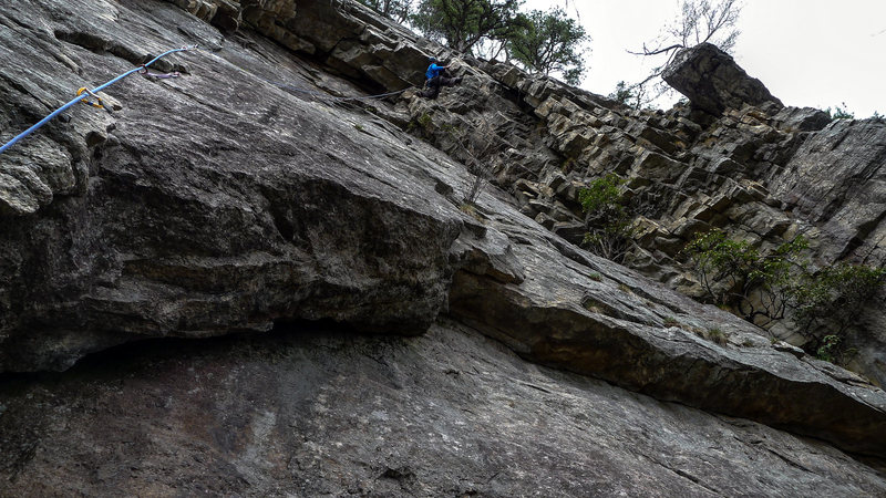 Pawel in the awkward bit of the traverse, all 6'7" of him