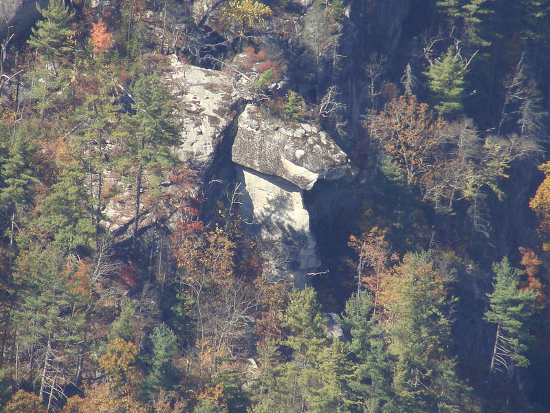 Picture taken from another site.  This is the pinnacle/spire from across the gorge.  The crag entrance is through the  chimney here.  The main wall is behind to the right and a bit out of sight.