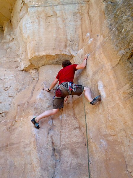 The crux of "Crime" hits you right at the start as you move above the "panty bolt". Once you've rounded the arete, follow the bolted line -directly- above you (not the line with black hangers slightly right).