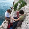 Couple of folks getting ready to belay the via ferrata traverse into Nolitudine