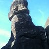 Does anyone know the name of this climb?<br>
<br>
It is located in the area just south of Bark's Canyon Wall  It is North facing, about 100' West of the standard rap behind Glory Road. You can clearly see the webbing in an aclove near the top.  <br>
<br>
Felt about 10a/b, 4-star fun.  90' Set of C4's .5-2, + a Blue Mastercam for the opening move sews it up.<br>
<br>
Starts with overhanging fingers on gear up through a roof.  Then 3 bolt face to a horizontal placement and a final small roof.  2 bolts with webbing in the scoop just before summit.